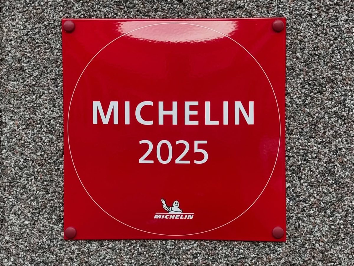 MICHELIN 2025 plaque on the LOWINE wall in Riga